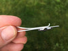 Cross Tie Bar side view in hand