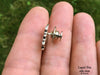 Bonsai Lapel Pin side view in hand