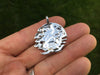 Bonsai Pendant back view in hand