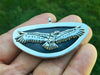 Condor and Big Sur Jade pendant in hand front view