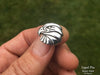 Eagle Head Lapel Pin in hand 