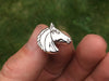 Horse Head Tie Tack in hand