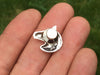 Horse Head Tie Tack in hand back view