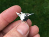 Hummingbird Tie tack in hand back view