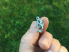 Sea Serpent lapel Pin in hand