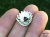 Sun Wave Lapel Pin sterling silver in hand back view